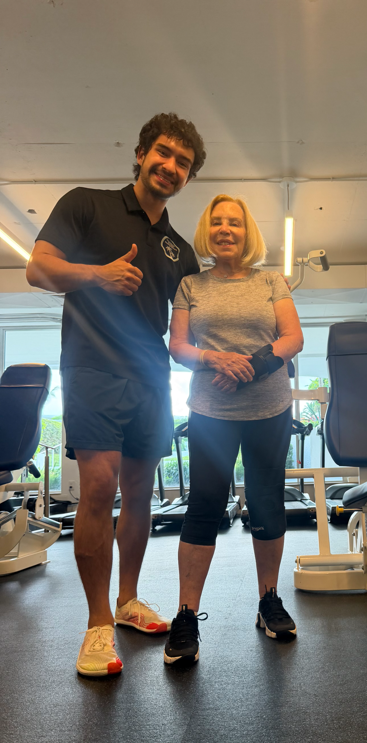 A PBFP coach with a client after a session